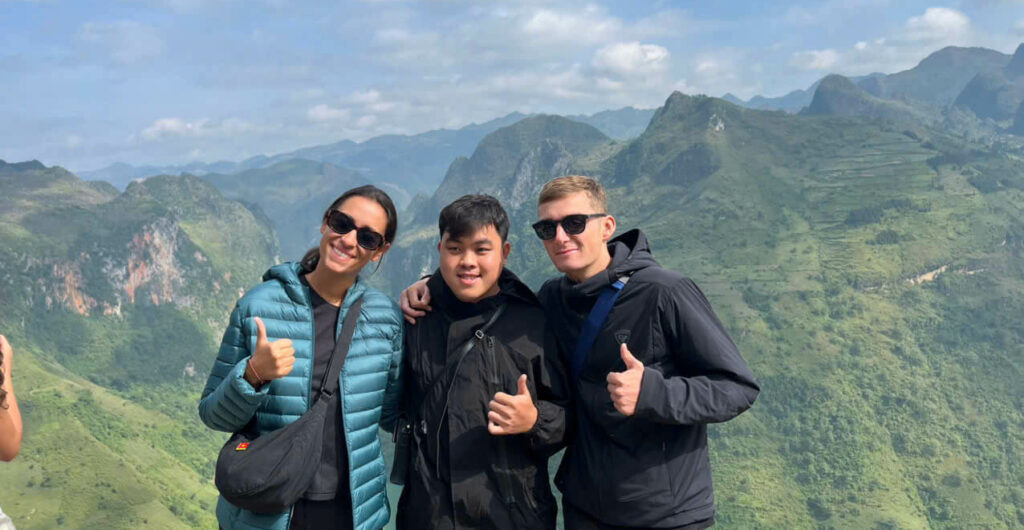 Passengers with their easy rider driver at Heaven Gate in Vietnam