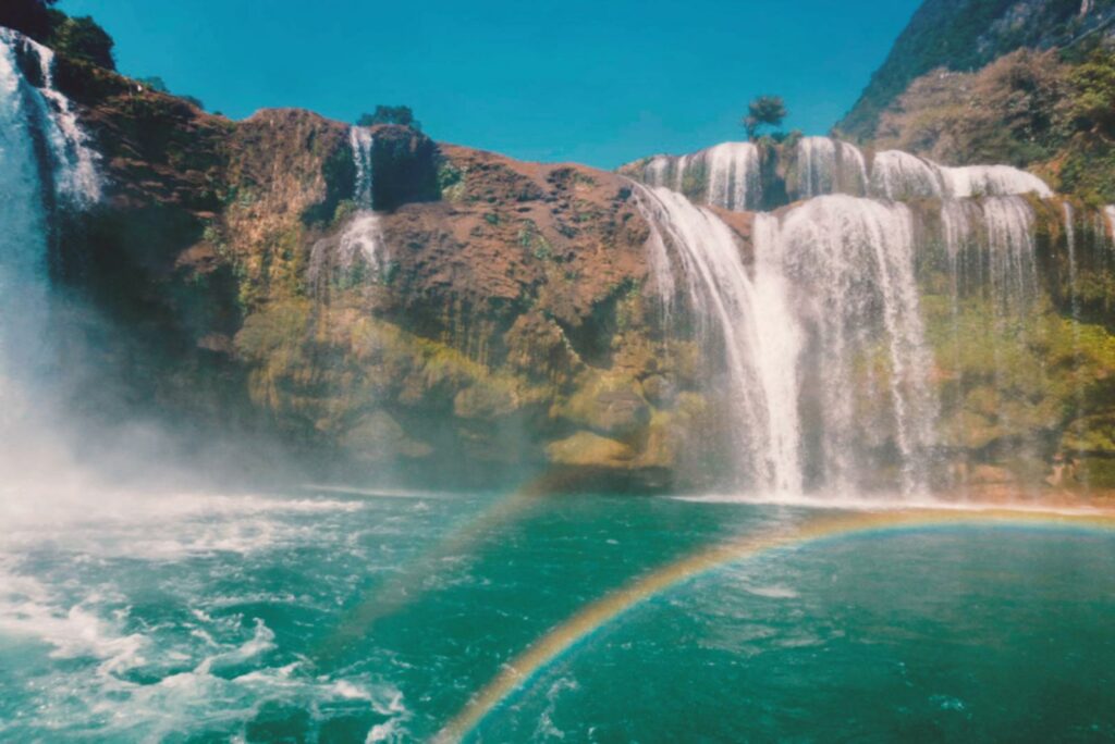 Ban Gioc Waterfall with rainbows from Ha Giang Loop and Cao Bang Tour