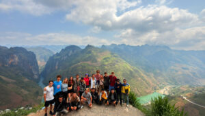 Ha Giang Loop Group Photo with happy people in Northern Vietnam
