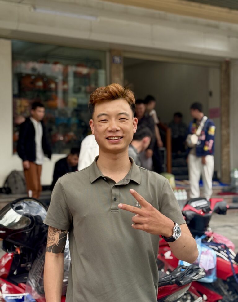 Easy rider tour leader posing with a peace sign