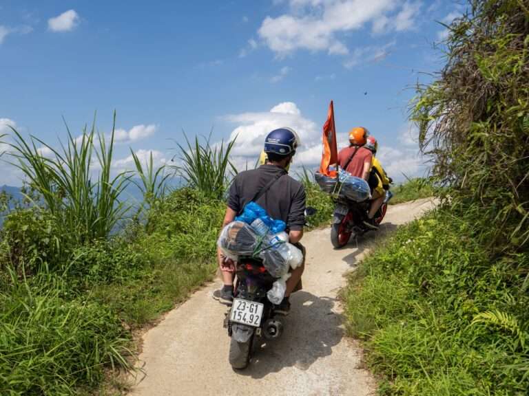 Easy Riders on off-the-beaten-path mountain roads on the 6-day Ha Giang Cao Bang combo tour
