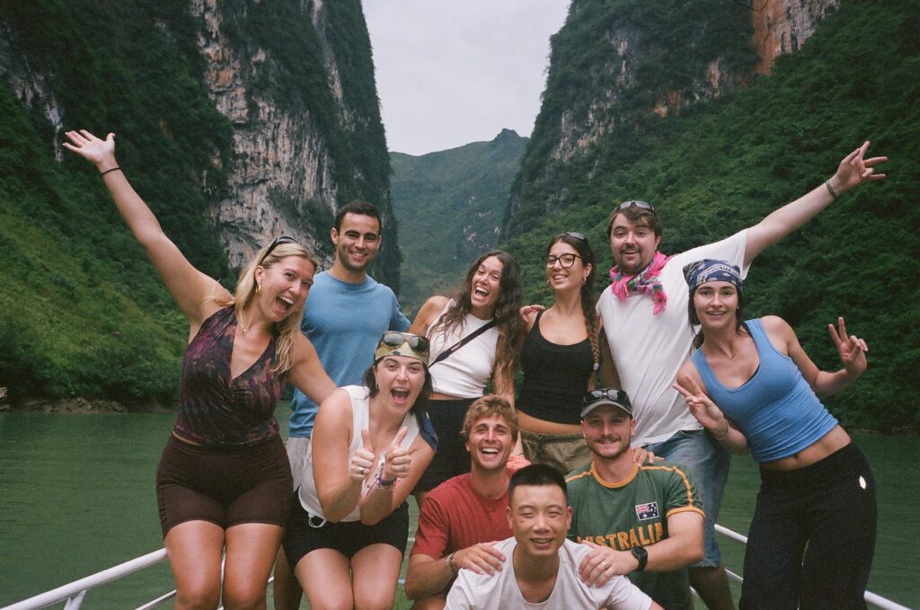 Guests on a boat ride on the Nho Que River