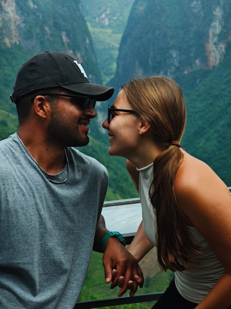 Couple enjoying a viewpoint on the Ha Giang Loop